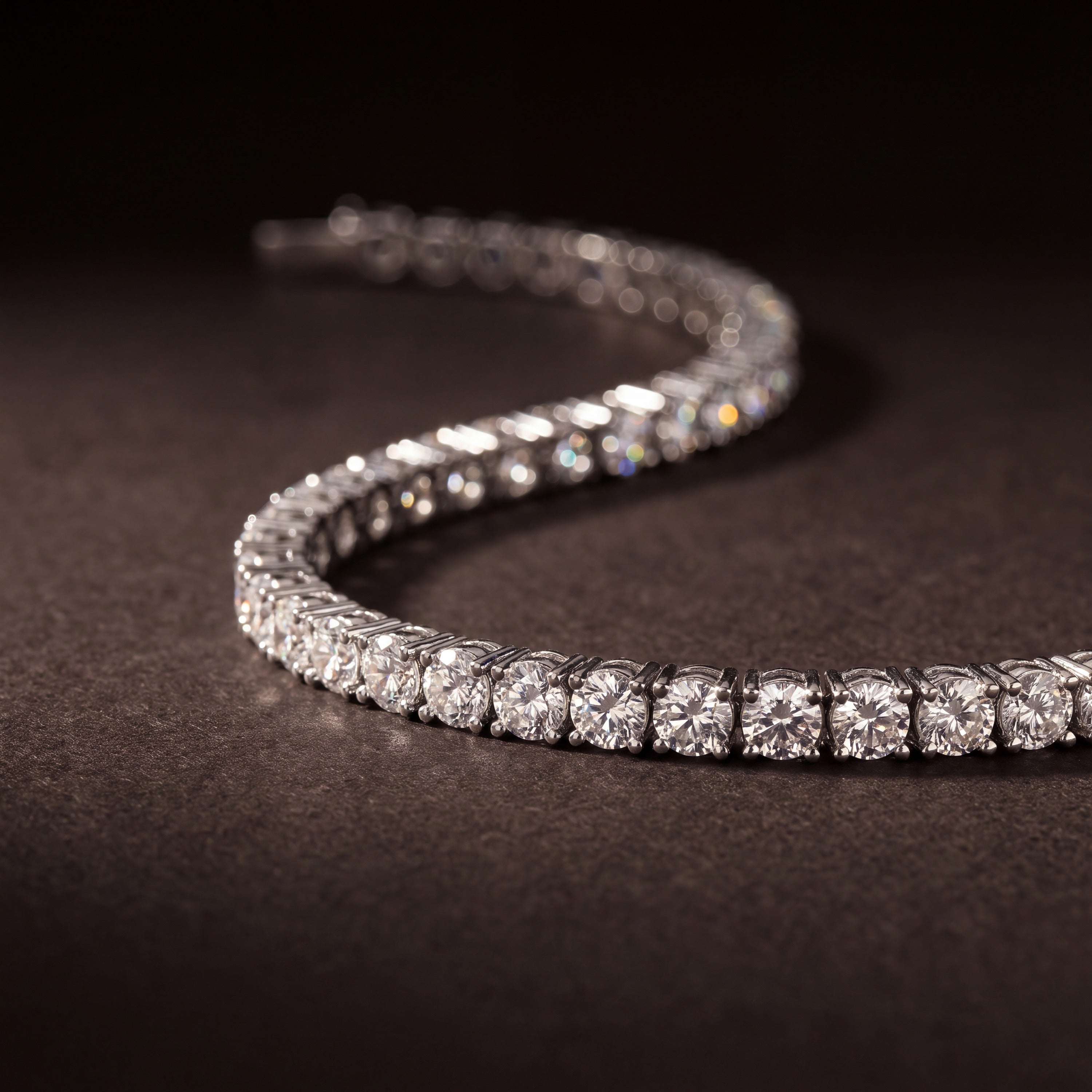 Hidden box clasp and continuous line of stones on a cubic zirconia tennis bracelet